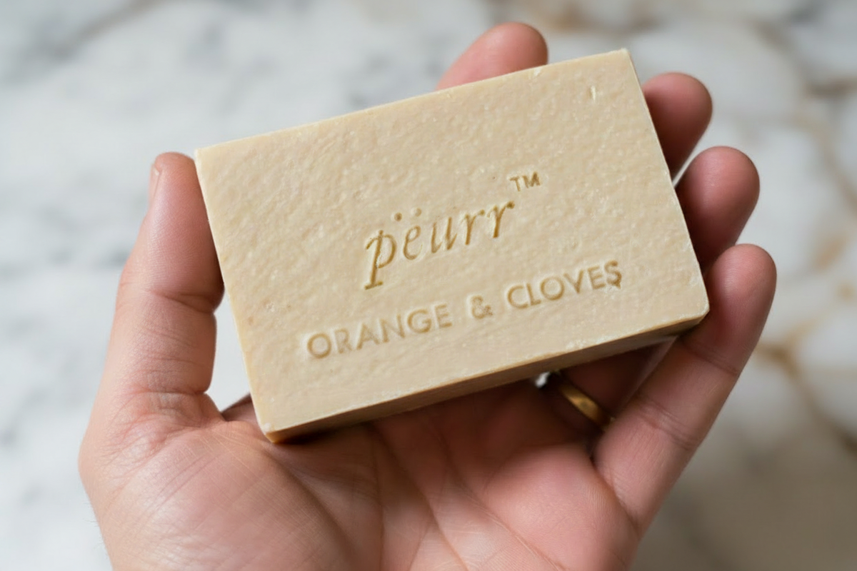 PËURR® Orange & Clove soap with the final s softened on the label