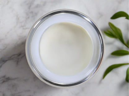 Open jar of peurr body butter showing creamy product